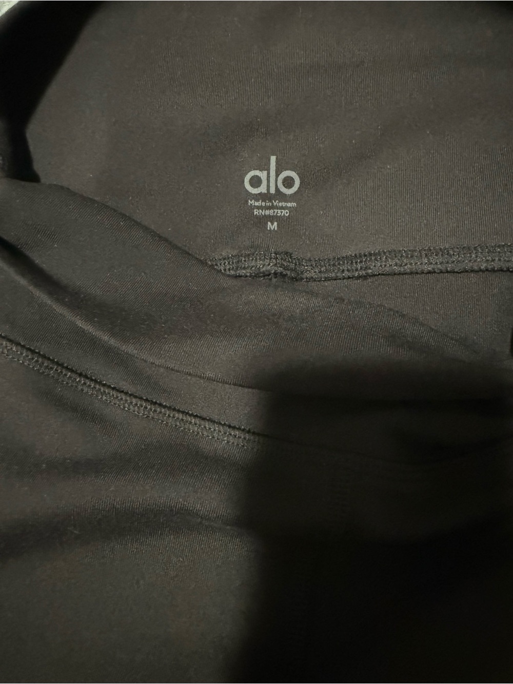ALO Yoga High-Rise Colorblock Leggings in Black, Light Blue and White - Picture 6 of 6